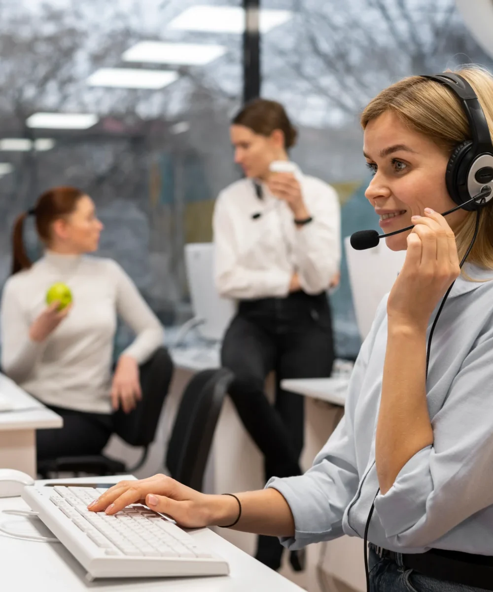 woman-working-call-center-talking-with-clients-using-headphones-microphone